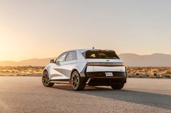 White Hyundai IONIQ 5 with a mountain view