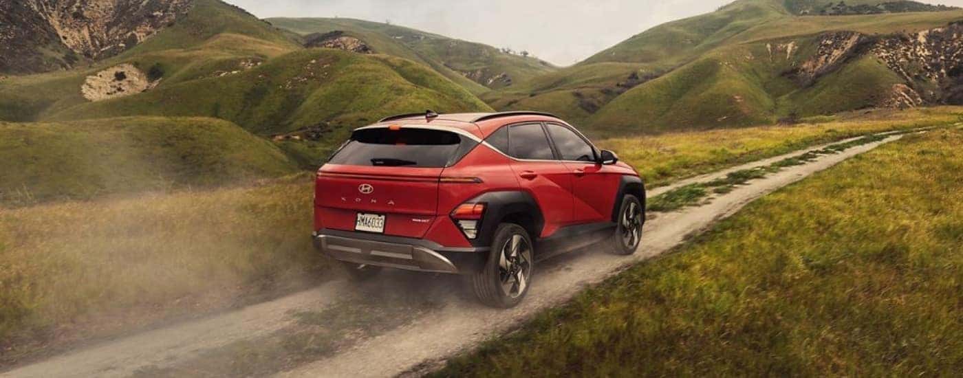 An orange 2025 Hyundai Kona from the rear after leaving a Hyundai dealer near Millbrook.
