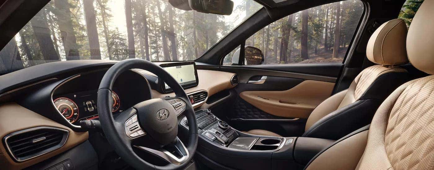 Black and tan leather interior in a 2023 Hyundai Santa Fe