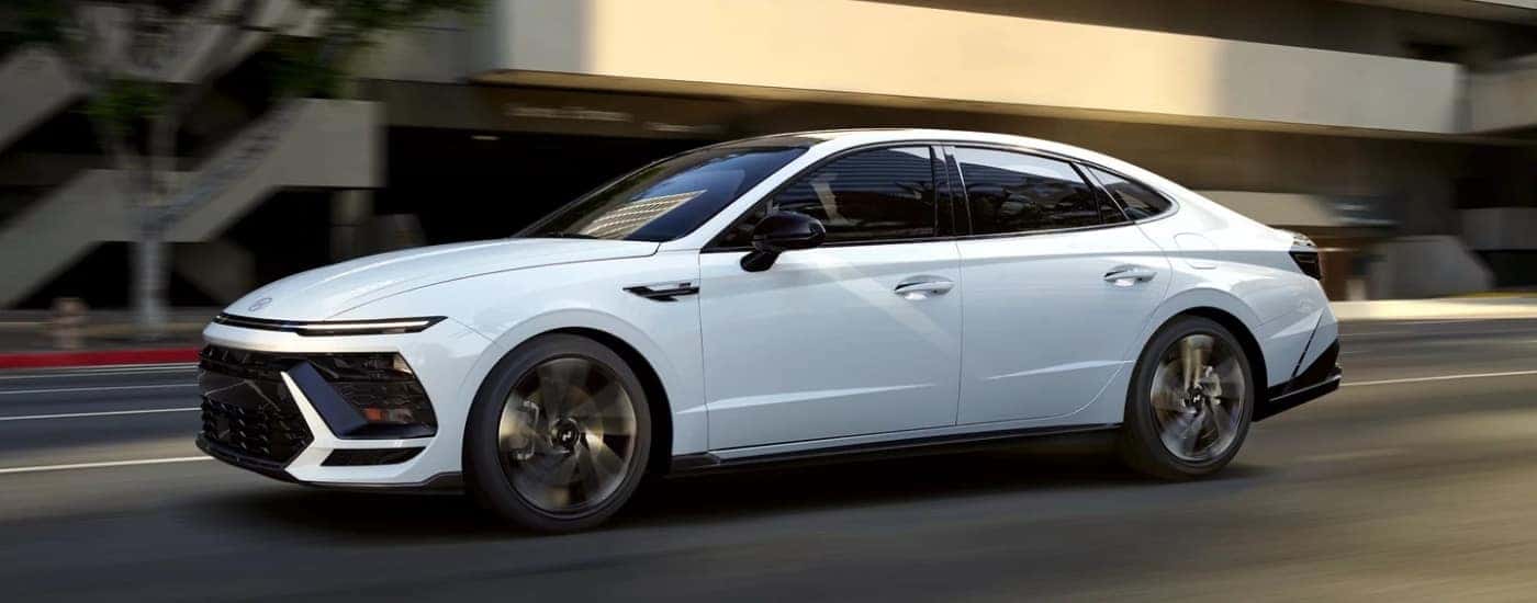A white 2025 Hyundai Sonata for sale from the side.