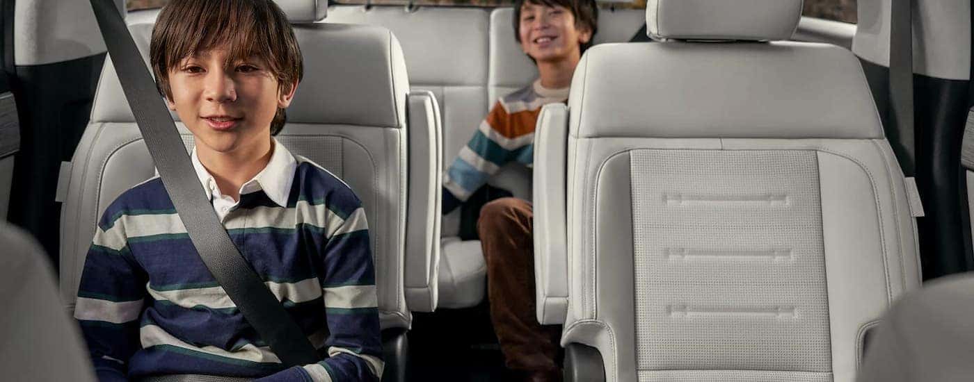 Children sitting in the rear seats of a 2025 Hyundai Santa Fe
