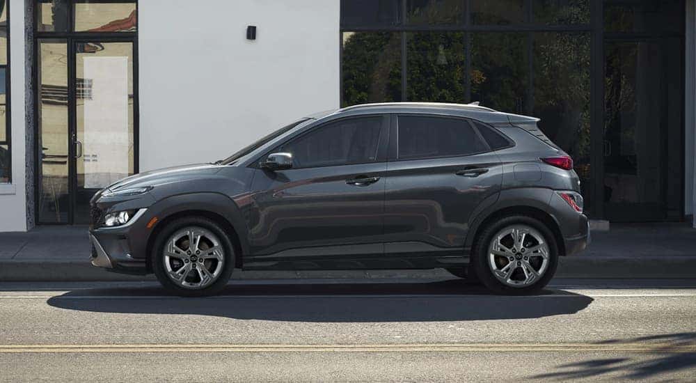 A gray 2022 Hyundai Kona parked on a city street