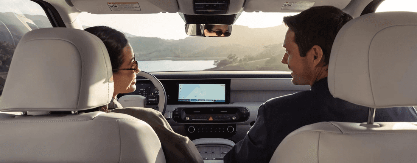 Two people in the front seat of a 2026 Hyundai Palisade