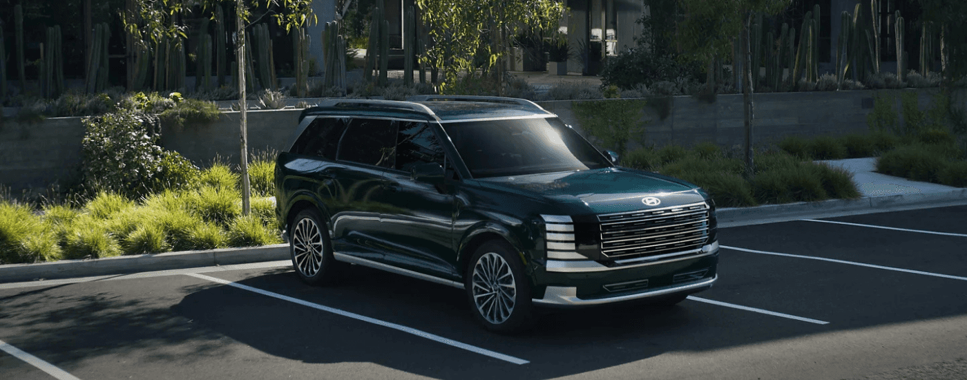 Green 2026 Hyundai palisade for sale near Birmingham parked outside a dealership