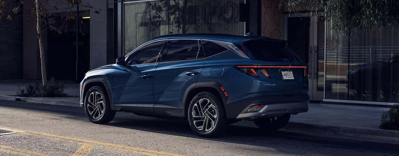 A blue 2026 Hyundai Tucson parked for sale near Auburn