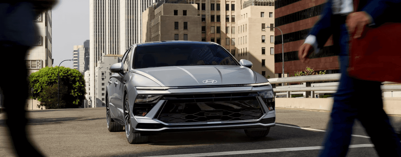 Silver 2025 Hyundai Sonata at a crosswalk