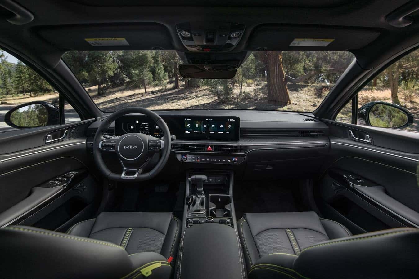 Interior view of the 2026 Kia K5 panoramic curved display and technology