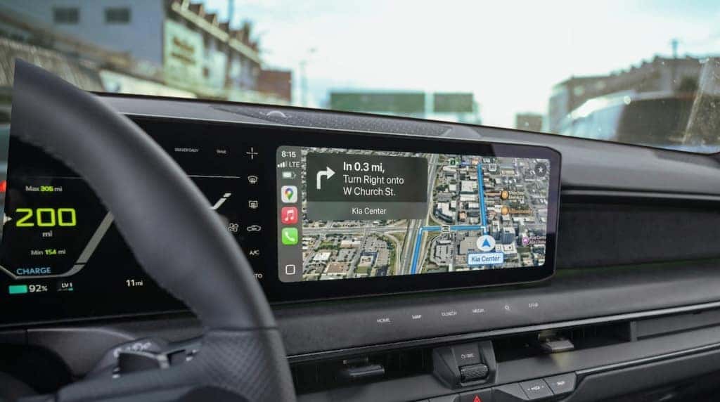 Kia EV9 dashboard navigation screen guiding to the Kia Center