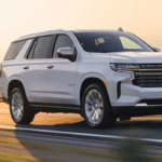 2021 chevy tahoe white exterior driving down road