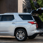 2021 chevy traverse white exterior with family