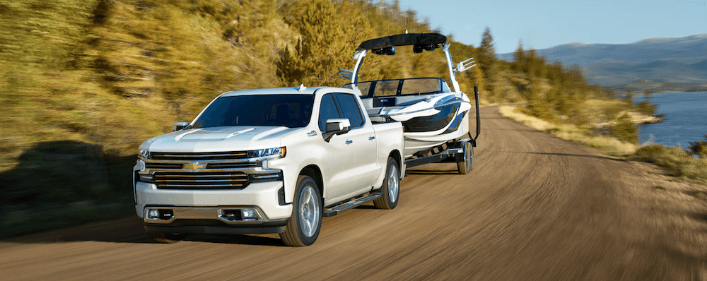 2021 chevy silverado 1500 white exterior towing boat