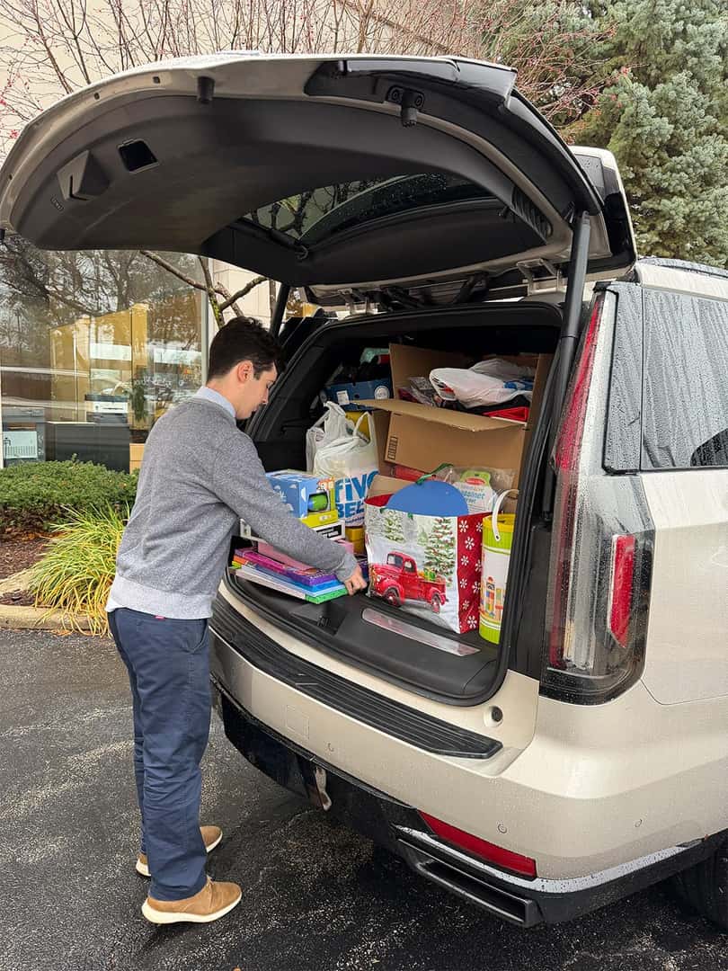 Jaguar Naperville Authorized Service participating in the Schaumburg community Holiday Toy Drive.