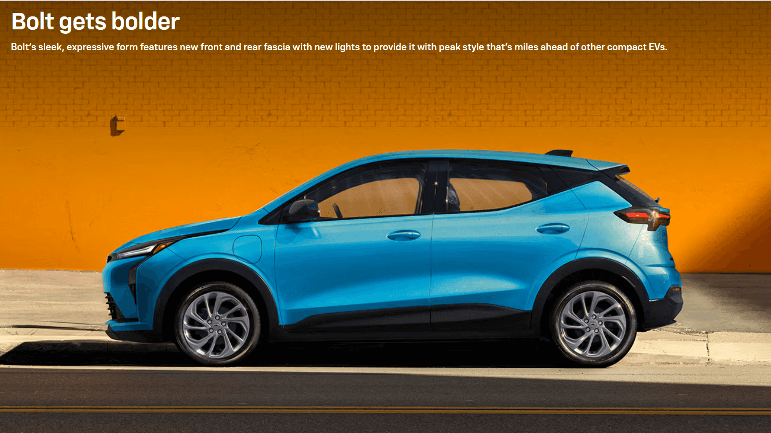2027 Chevy Bolt in blue on a street