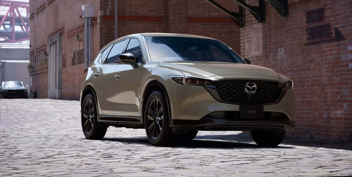 Mazda CX-5 sitting parked in an alley way. 