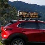 Red Mazda CX-5 with a roof rack