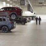 A wide shot of a Mazda service bay.