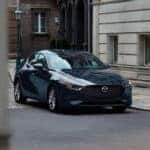 Mazda3 driving city street