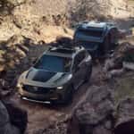 Mazda CX-50 towing a small camper trailer