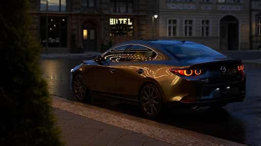 Mazda sedan rear night