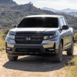Front angle of 2026 Honda Ridgeline with mountains in background