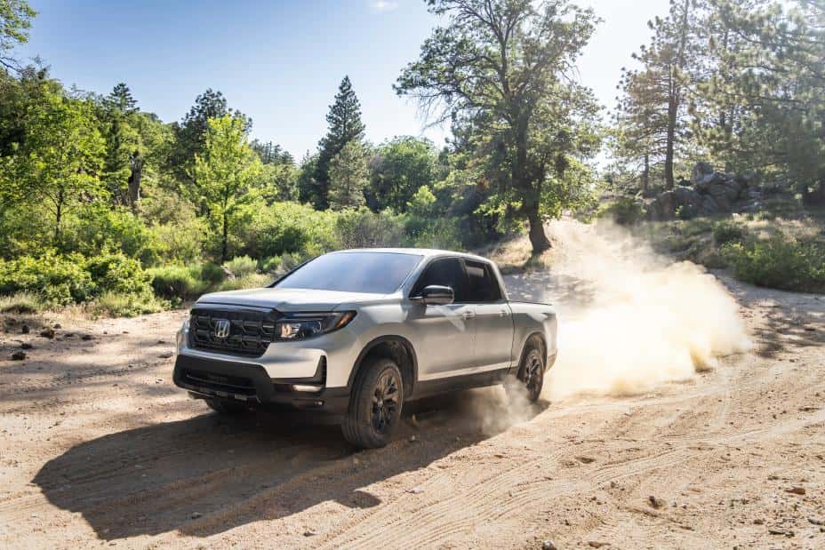 2026 Honda Ridgeline RTL | Photo Courtesy: Honda New 2026 Honda Ridgeline driving down dirt road
