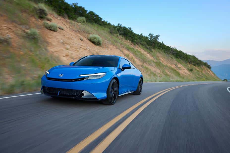 Blue 2026 Honda Prelude drives down highway