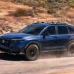 2026 Honda CR-V with Blue Exterior driving in the desert