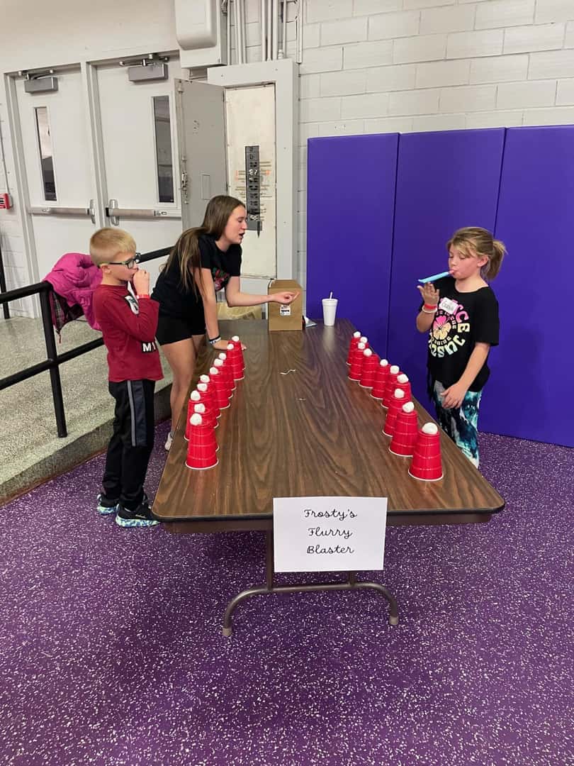 children playing games with cups