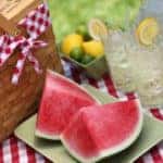 Picnic basket with watermelon and lemonade