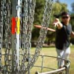 Man playing disc golf