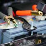 car battery with jumper cables