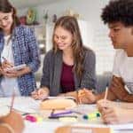 Group of college students studying together
