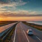 car driving at sunset