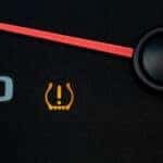 Tire Pressure Monitor System Light on a Dashboard