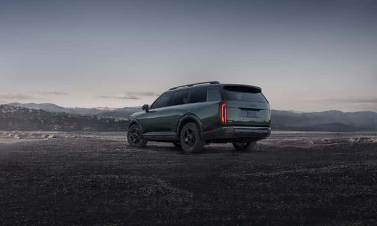2027 Kia Telluride parked facing away in mountains