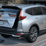 2020 Honda CR-V with man loading flowers into trunk