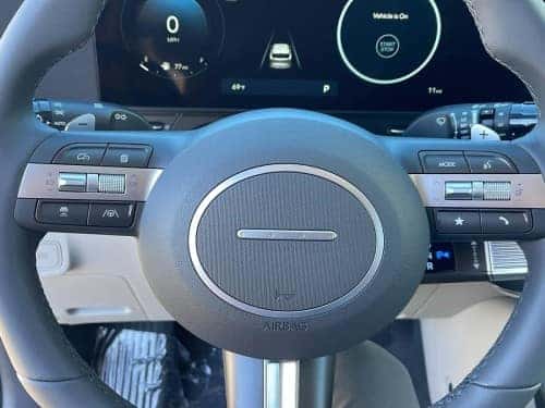 2025 Hyundai KONA close up view of driver's dash and steering wheel
