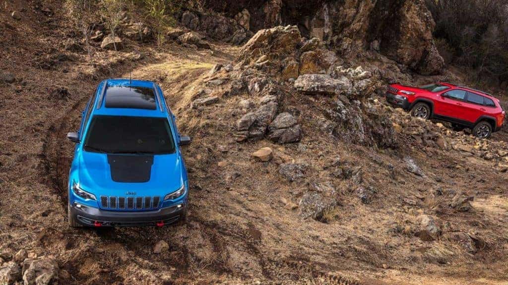 Jeep Cherokee Trailhawk rock hopping blue
