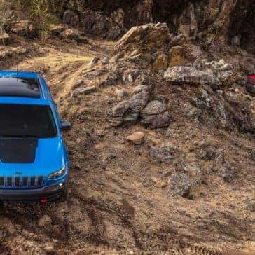 Jeep Cherokee Trailhawk rock hopping blue