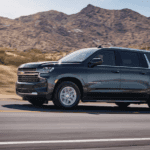 2021 chevy suburban black exterior driving down road
