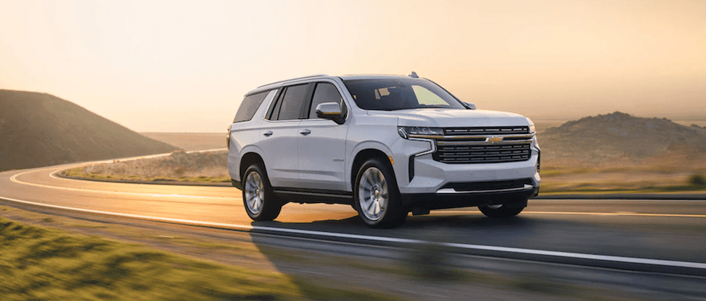 2021 chevy tahoe white exterior driving down road