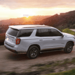2021 chevy tahoe white exterior driving down scenic road