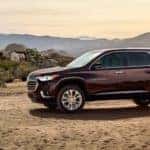 2020 chevrolet traverse dark red exterior parked in desert