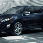 2020 chevy equinox dark blue exterior parked inside