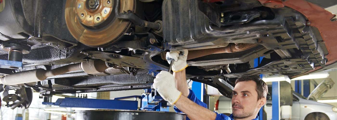 mechanic working on car