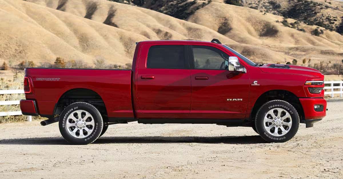 Red Ram 2500 pickup truck parked in front of dry, rolling hills