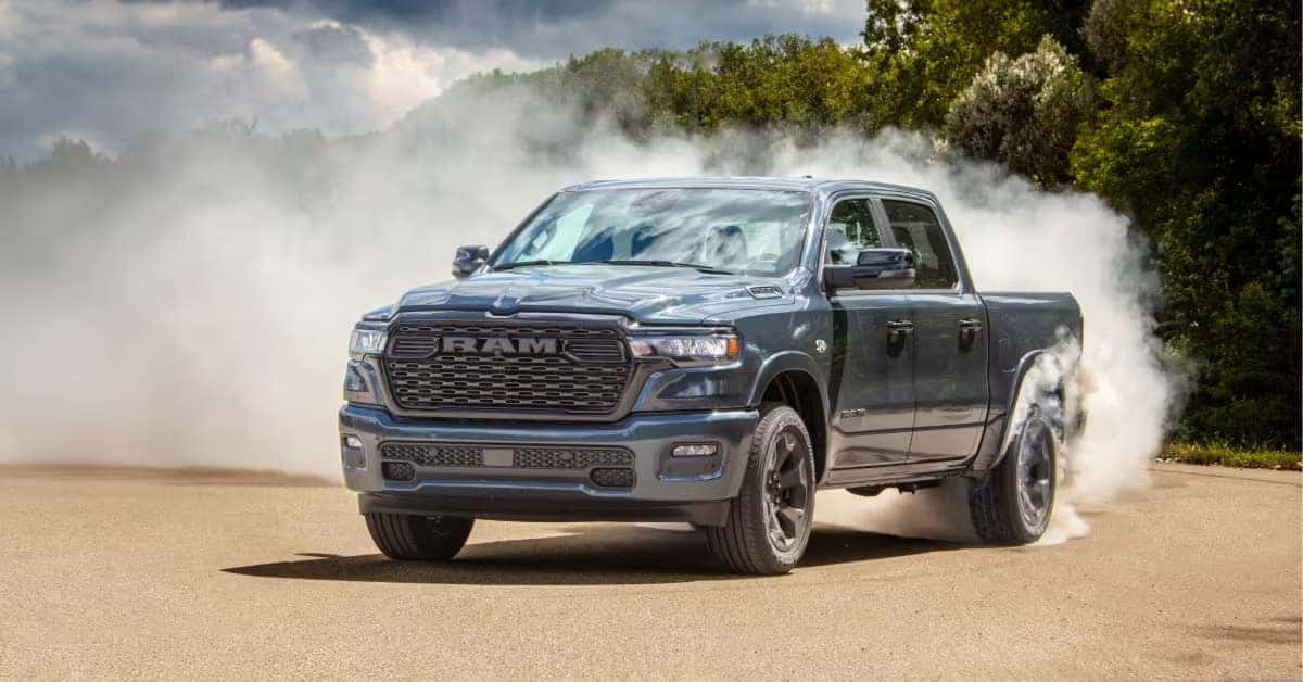 2026 Ram 1500 driving in a sandy area