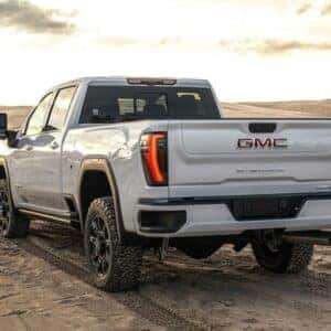 2024 GMC Sierra 2500HD AT4 Rear Driver Side View