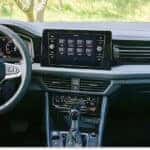 Dashboard and front interior cockpit of a 2026 Volkswagen Jetta featuring a central touchscreen display.