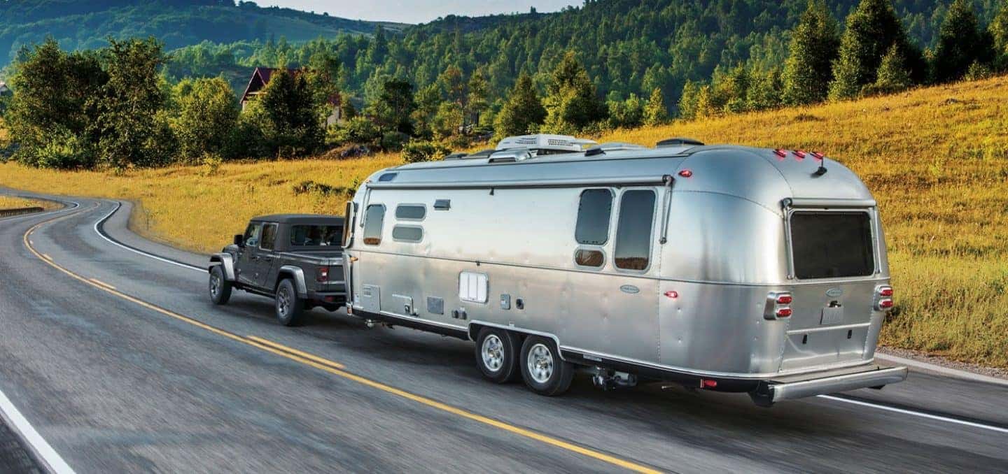 2026 Jeep Gladiator towing a trailer